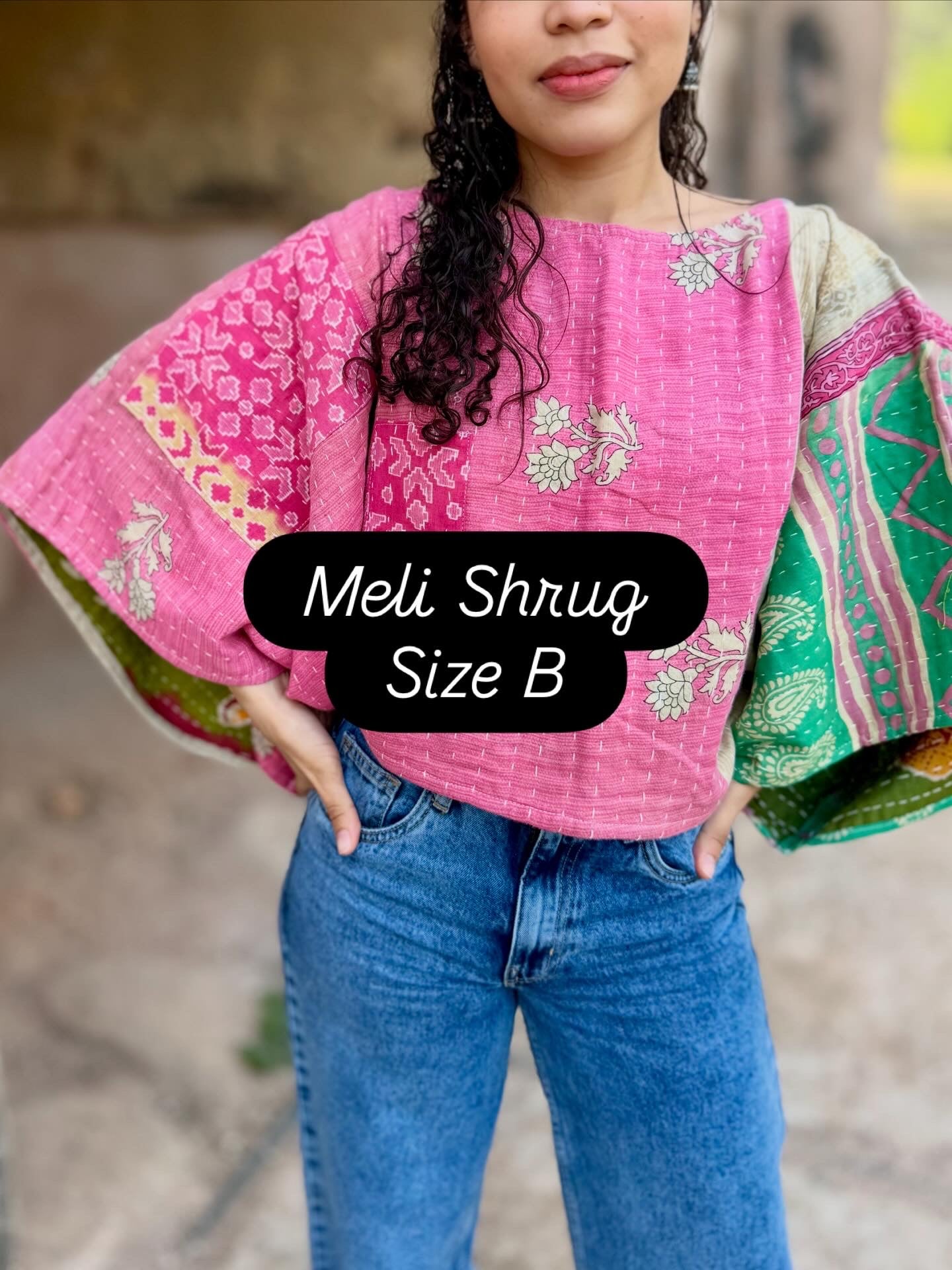 Meli Shrug